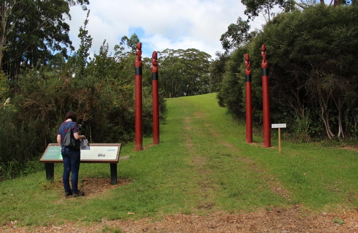 Waharoa (carved entrance way) mark the start of the Kororipo Pā Historic Walk.