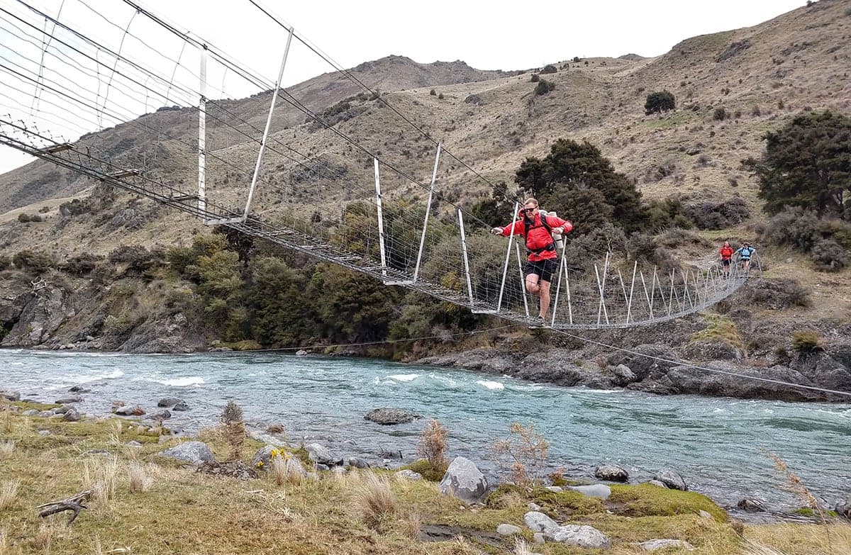 Swing bridge over river.