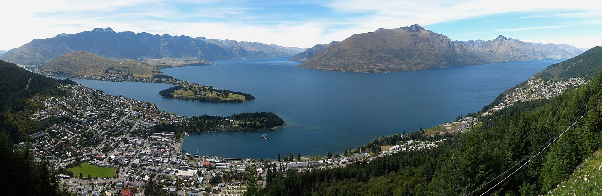 Queenstown below the gondola viewpoint, with Lake Wakatipu and surrounding mountains.
