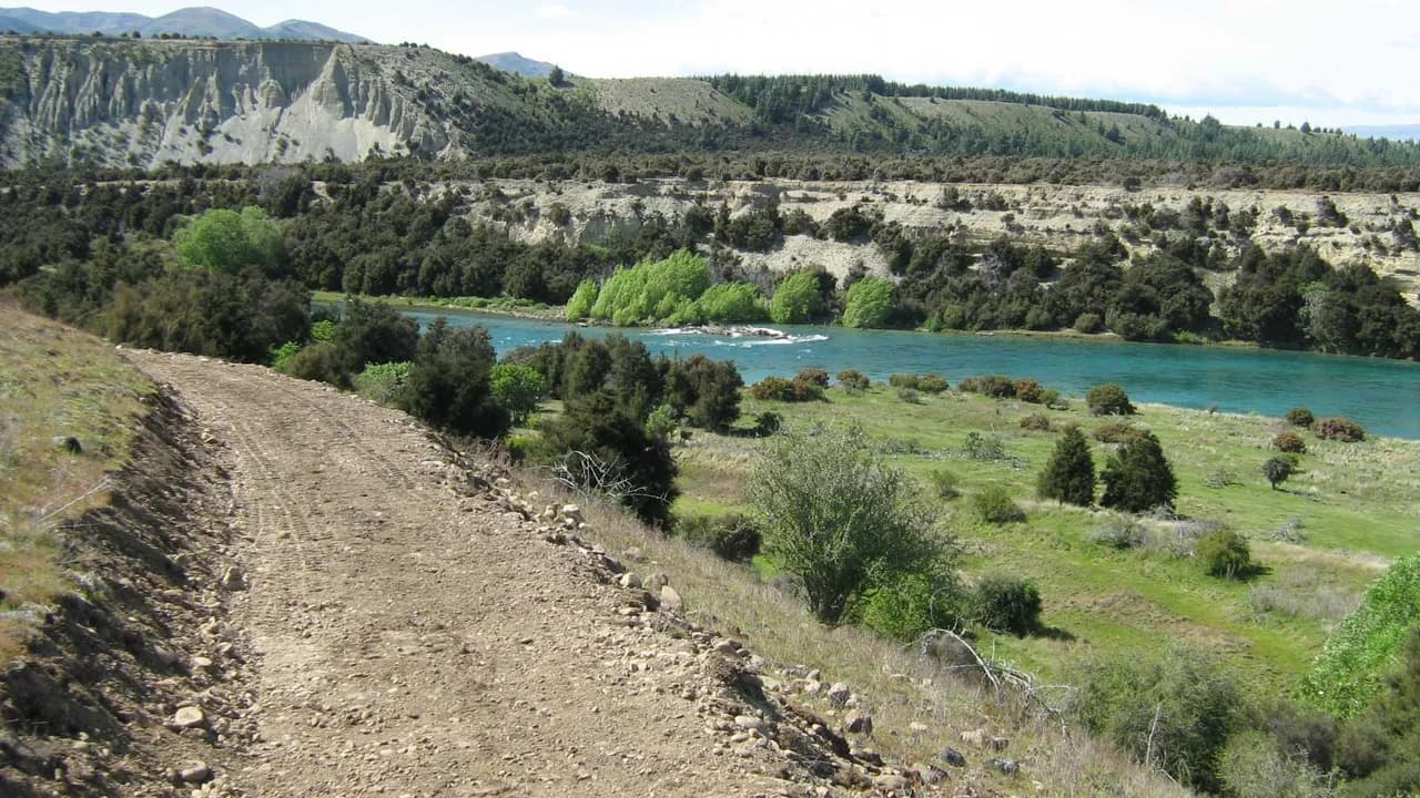 Newcastle Track with views of the Clutha River: Gravel Newcastle Track above the Clutha River.