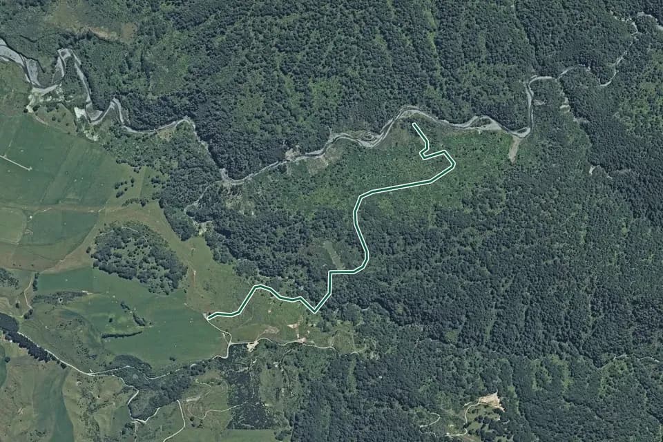 Historical aerial overview of the mapped Alice Nash Memorial Heritage Lodge Track route, with an indicative DOC route overlay.