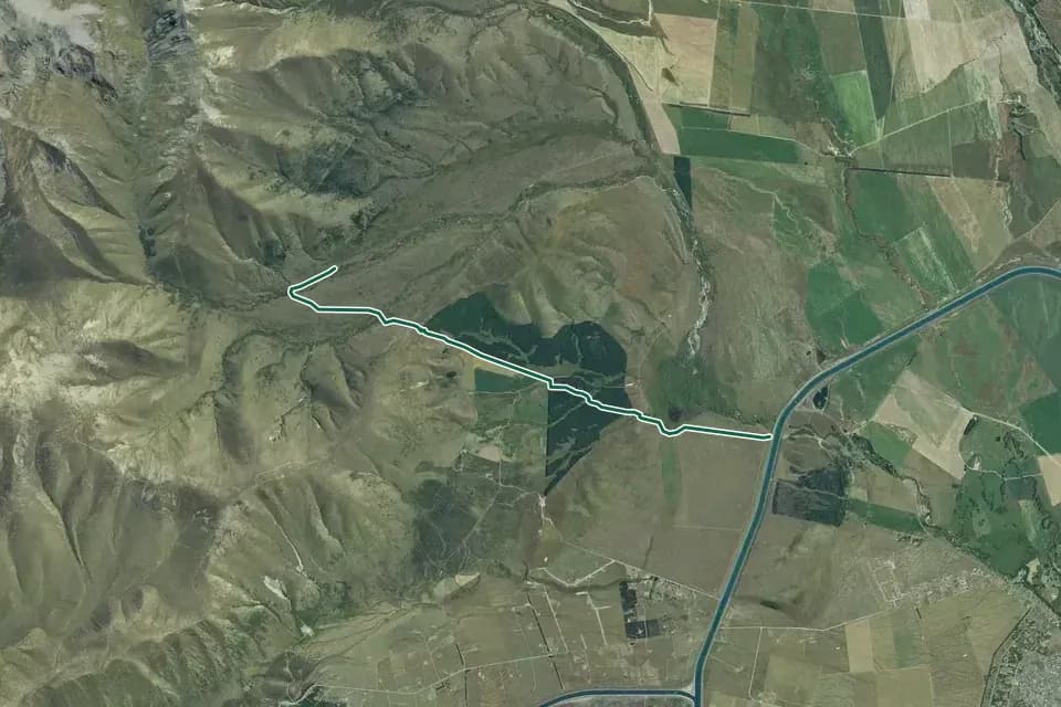 Historical aerial overview of the mapped Pyramid Track route, with an indicative DOC route overlay.