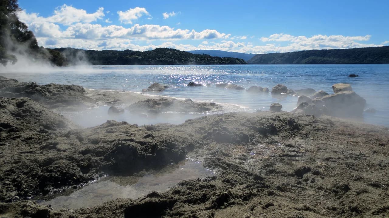 Hot Water Beach: Steaming Hot Water Beach shoreline, not camping pitches.