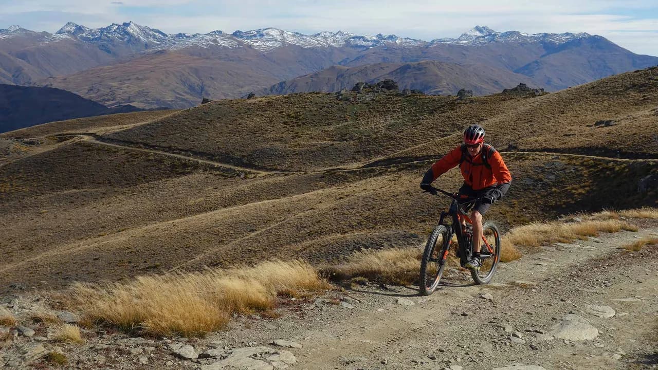 Mountain biker on Mt Difficulty Track: Mountain biker on Mount Difficulty Track.